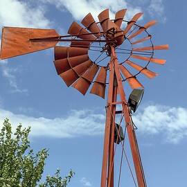Rustic Sentinels The Stillness of an Abandoned Windmill by Travel Essayist