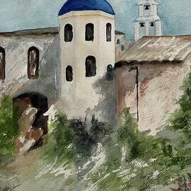 Santorini's Buildings by Judy Strickland