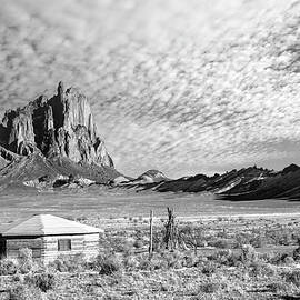 Shiprock Pinnacle and Navajo Hogan by Howard Holley
