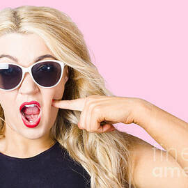 Shocked blonde makeup woman. Cosmetic application by Jorgo Photography