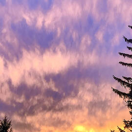 Silhouetted Skies and Dramatic Clouds by Travel Essayist