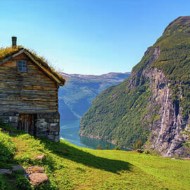 Skagefla Mountain Farm Overlooking Geirangerfjord in Norway by Miroslav Liska