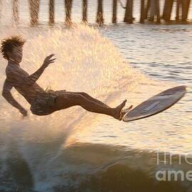 Skimboarder Caught in Sunset Splash 6842 by Donn Ingemie
