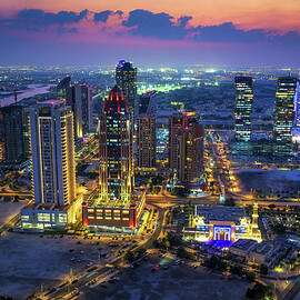 Skyline of Doha, Qatar, viewed at dusk by Miroslav Liska