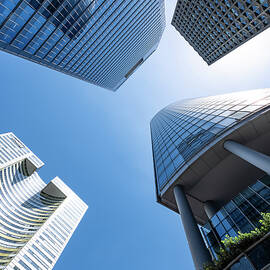 Skyscrapers Against Blue Sky by The Luxury Art Collection