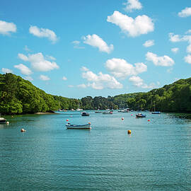Small boat moorings in the Helford Estuary at Port Navas by Seeables Visual Arts
