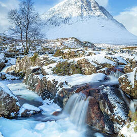 Snow covered Buachaille Etive Mor in the Scottish Highlands by Neale And Judith Clark