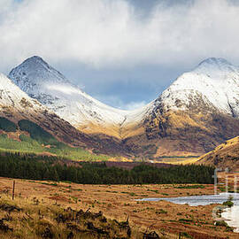 Snow covered mountains of the Scottish Highlands, Glen Etive, Scotland, UK by Neale And Judith Clark