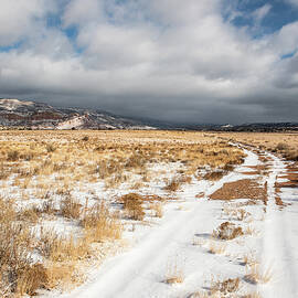Snow Dusted Ranch Road in New Mexico by Tom Cochran