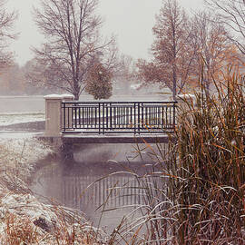 Snowy Autumn Bridge by Kevin Schwalbe