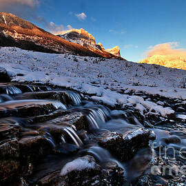 Snowy Mountain Stream at Sunrise by Thomas Nay