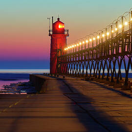 South Haven Lighthouse at Sunset by Michael Collins