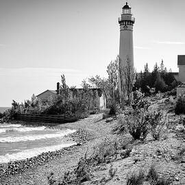 South Manitou Island LIghthouse in Lake Michigan by Mary Lee Dereske