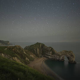 Starry Night Sky Over Durdle Door by Charnwood Photography Fine Art