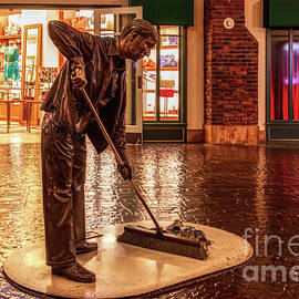 Street Sweeper Bronze Statue in Paris Las Vegas by Tatiana Travelways