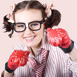 Strong Driven Business Woman Wearing Boxing Gloves by Jorgo Photography