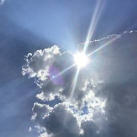 Diamond in the Sky Clouds by Catherine Wilson