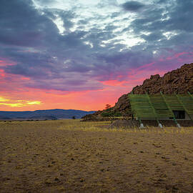 Sunrise above a small cabin in a desert lodge near Sossusvlei in Namibia by Miroslav Liska
