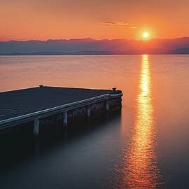 Sunrise on Flathead Lake  by Adam Mateo Fierro