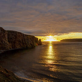 Sunrise Over Perce Rock 1 by John Twynam