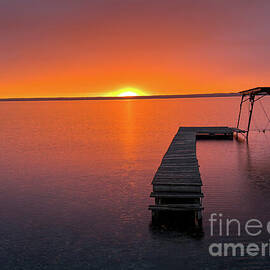 Sunrise Over Serene Lake by William Norton