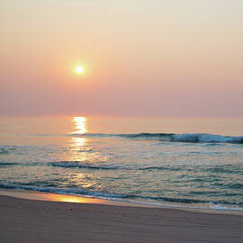 Sunrise Reflections over the Ocean