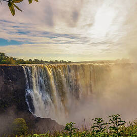 Sunset at the Victoria Falls on Zambezi River in Zimbabwe by Miroslav Liska