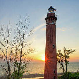 Sunset by the Little Point Sable Lighthouse by Michael Collins