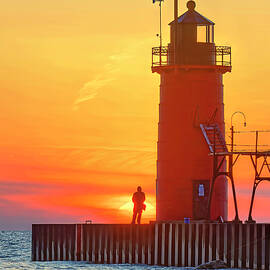 Sunset by the South Haven Lighthouse by Michael Collins