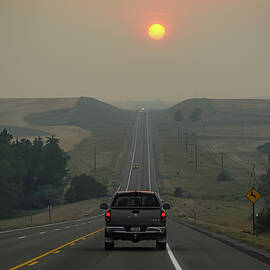Sunset in the Smoke of Montana Wildfires by Mary Lee Dereske