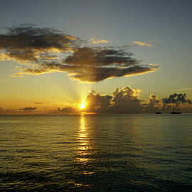 Sunset off Kooddoo Island Maldives by Waterdancer