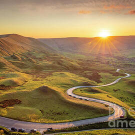 Sunset on the winding road to Barber Booth, Peak District National Park, Derbyshire, England by Neale And Judith Clark