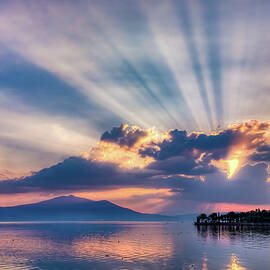 Sunset Rays Over Lake Chapala by Tommy Farnsworth
