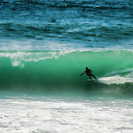 Surfer in a tube by Waterdancer