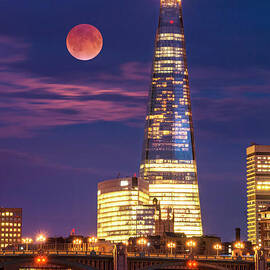 The Shard and red moon, London by Neale And Judith Clark