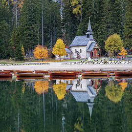 Tranquil Lakeside Chapel in Autumn by Elvira Peretsman