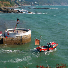 UK, Cornwall, Looe, 'Banjo' pier, fishing boat departing by Seeables Visual Arts