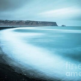 Vik black beach and Reynisdrangar rocks, Iceland by Neale And Judith Clark