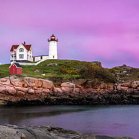 Vivid Sunset at Nubble Lighthouse by Richard DeYoung
