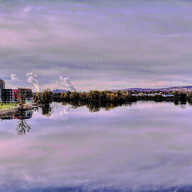 Wausau Along A Calm Wisconsin River by Dale Kauzlaric