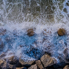 Waves Crashing on Rocky Shore by Oceanic SkyView