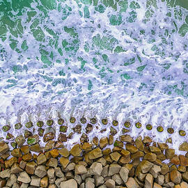 Waves Crashing Over Rock Barrier by Oceanic SkyView