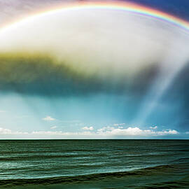 White Clouds Blue Skies and Rainbows in Mazatlan Mexico by Tommy Farnsworth