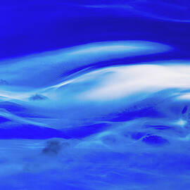 Wispy clouds by Tommy Farnsworth