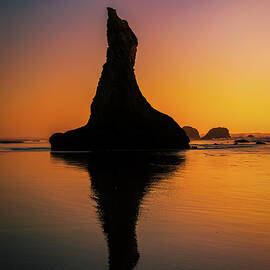 Wizards Hat Sea Stack Reflection At Sunset by Dan Sproul