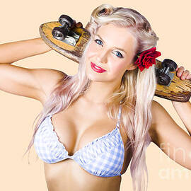 Woman holding skateboard by Jorgo Photography