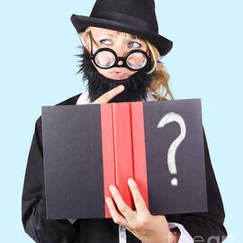 Wondering woman with text book question by Jorgo Photography