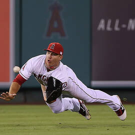 Yoenis Cespedes and Mike Trout by Jeff Gross
