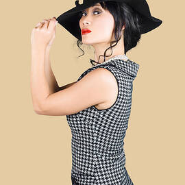 Young beautiful asian brunette in retro dress by Jorgo Photography