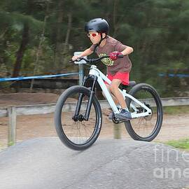 Young Cyclist on BMX Track 2409 by Donn Ingemie